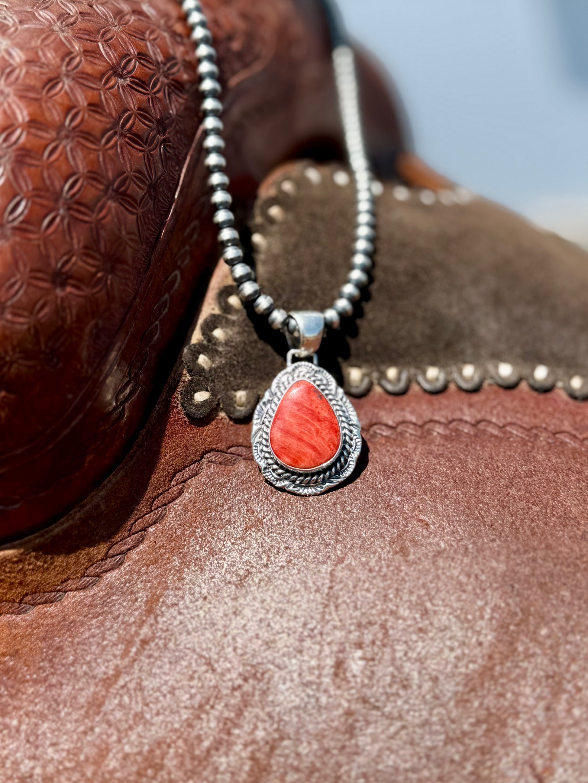 Spiny oyster shell pendant