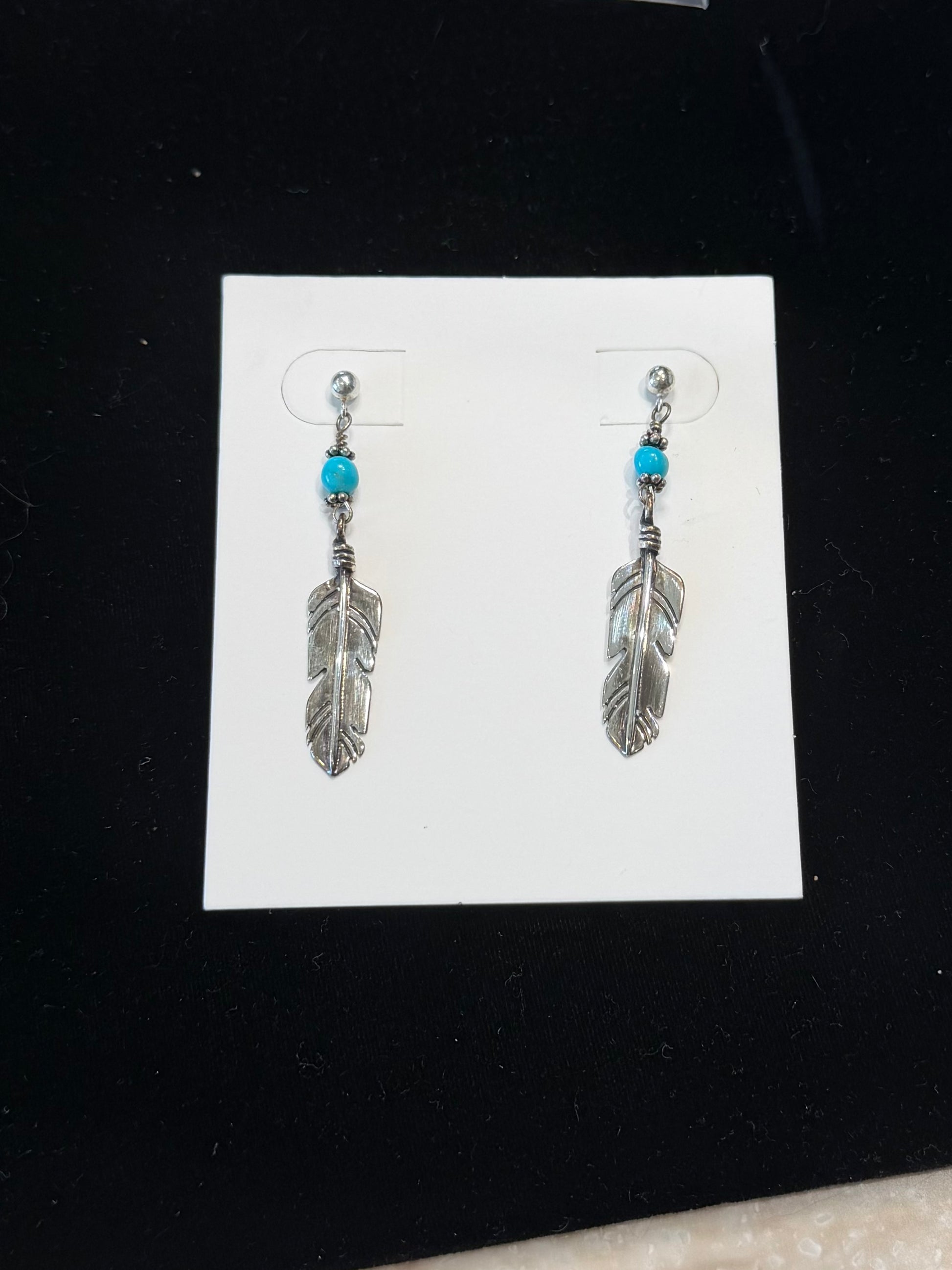 Single feather w turquoise