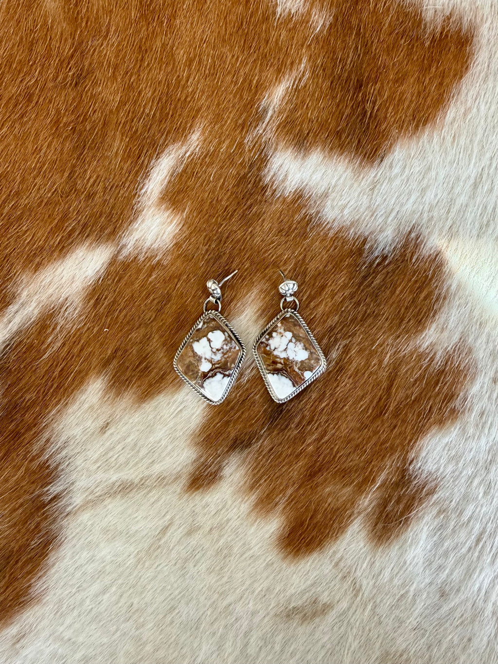 White buffalo earrings